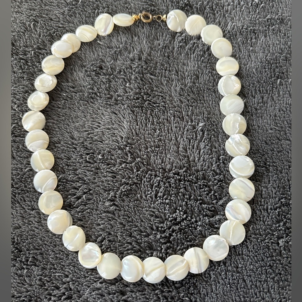 2/$20 Vintage flat disc necklace.